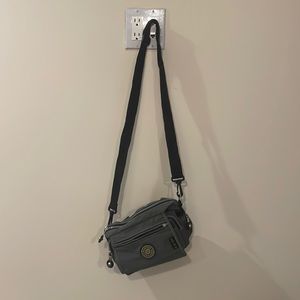 Kipling. Gray and black.